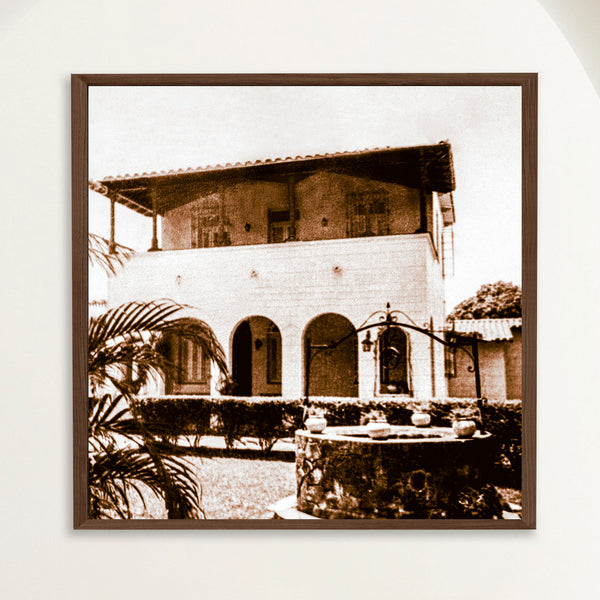 Sepia photograph of a Spanish Colonial country house near 1940s Havana, framed in oak. Close view.