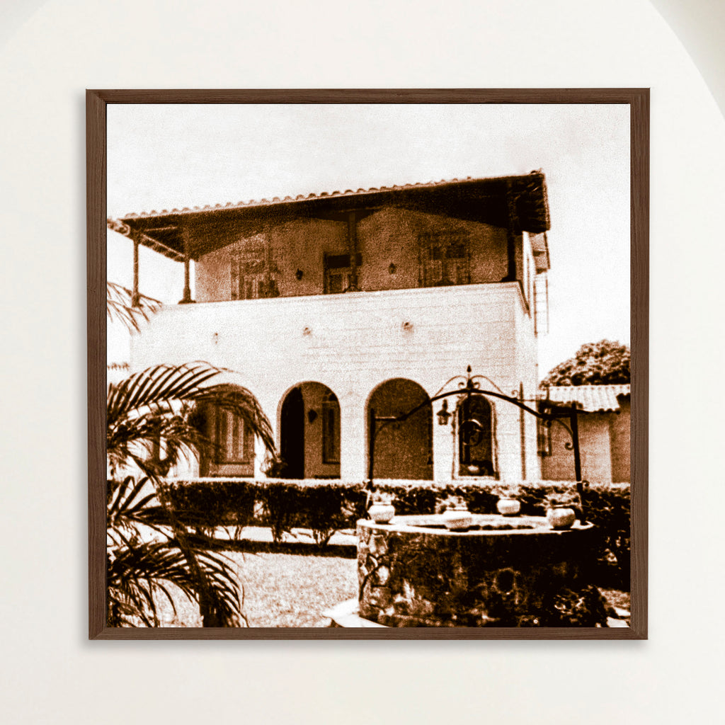 Sepia photograph of a Spanish Colonial country house near 1940s Havana, framed in oak. Close view.
