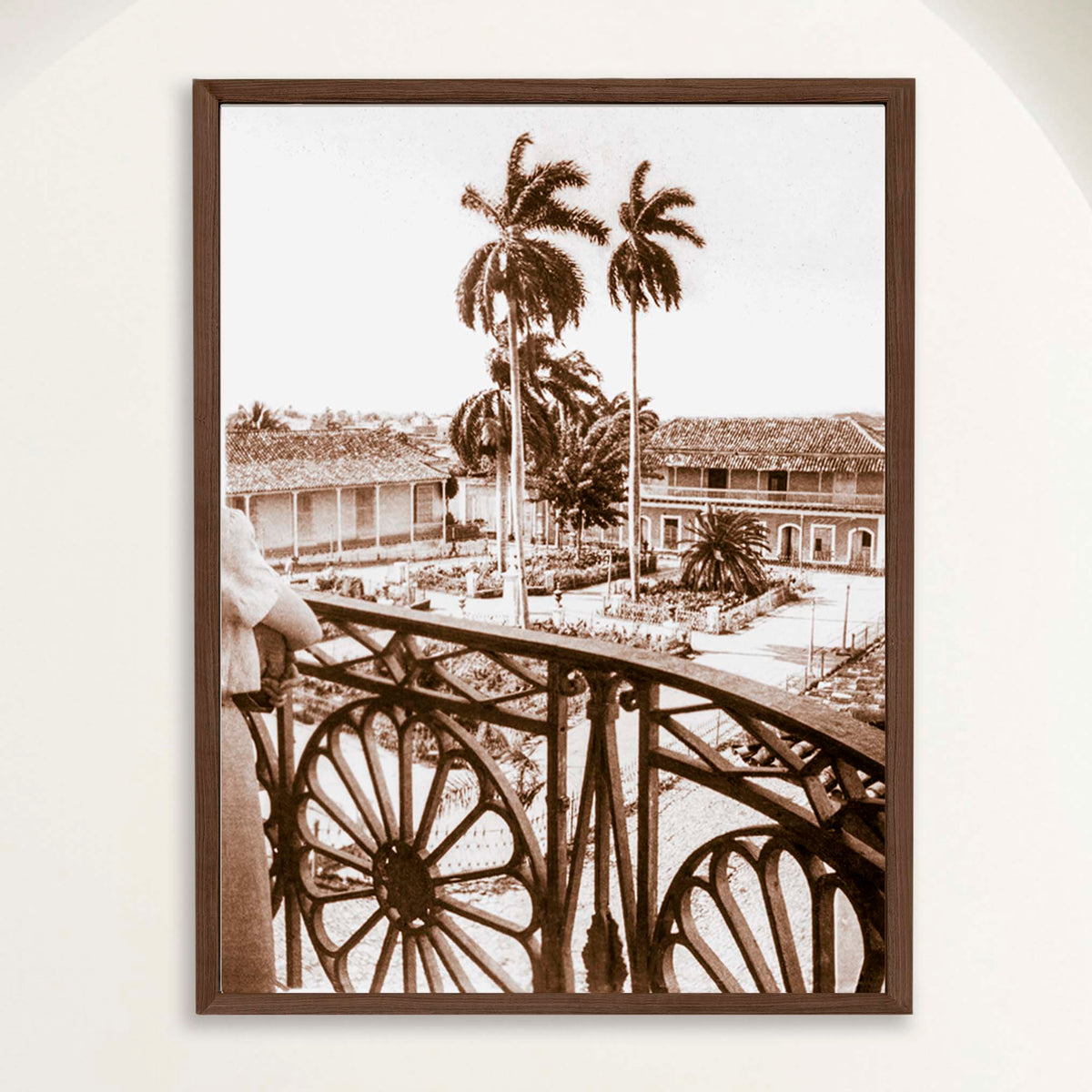 Sepia photograph of Trinidad's Plaza Mayor with palms and wrought iron in 1948, framed in oak. Close view.