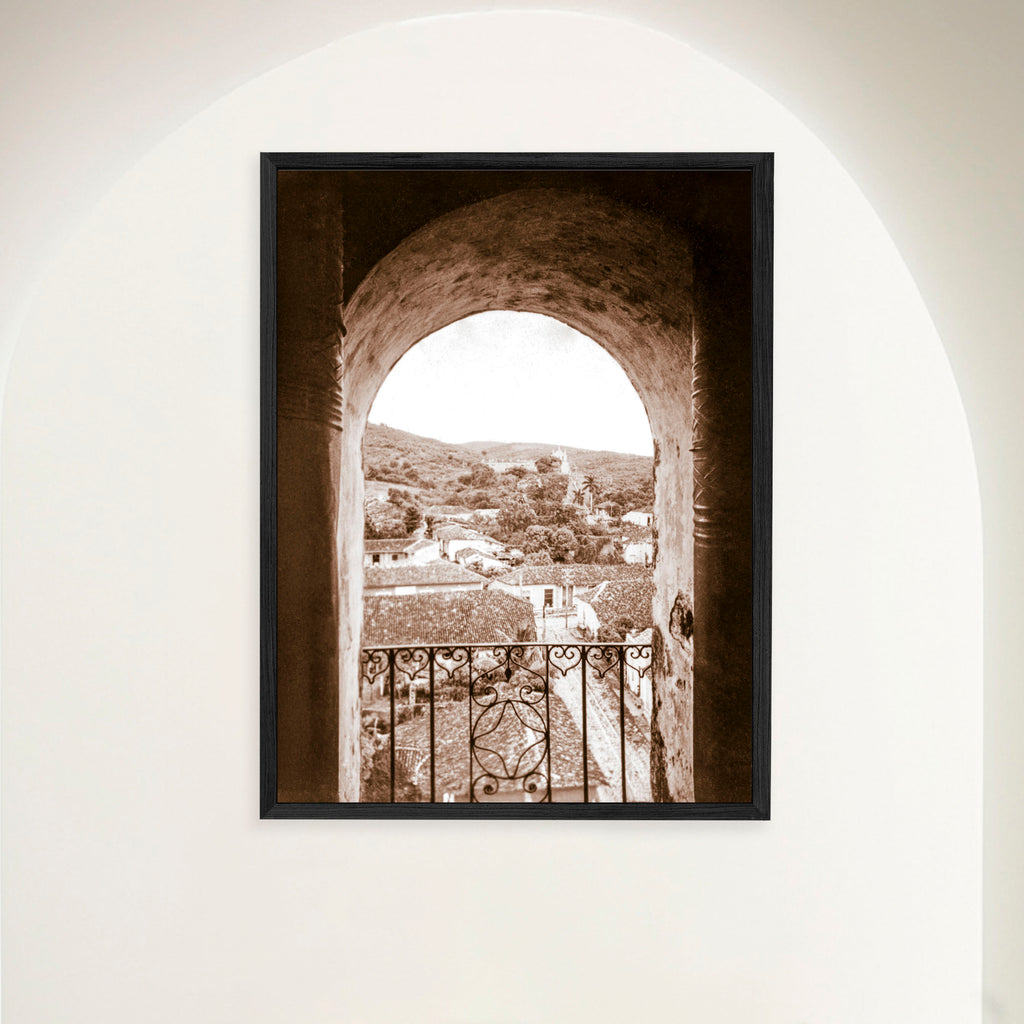 Framed vintage sepia 1948 photograph of Trinidad Cuba vista through the bell tower arch of San Francisco monastery.
