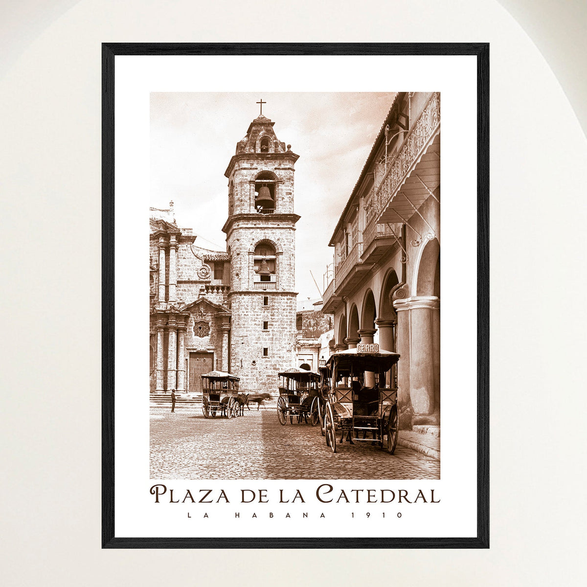 Vintage travel poster of Havana's Plaza de la Catedral in 1910 with horse-drawn carriages, framed in oak. Close view.