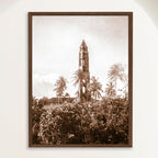 Sepia photograph of the Torre Manaca-Iznaga rising above palms in 1940s Cuba, framed in oak. Close view.