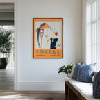 A framed vintage-style Art Deco Cuba illustration hangs on a white wall in a bright window interior. The artwork shows a bird perched on a cigarette holder as it watches  a 1920s flapper woman smoking. Below is  the word "SOCIAL" in blue letters. From Atlantic & Havana - atlanticandhavana.com